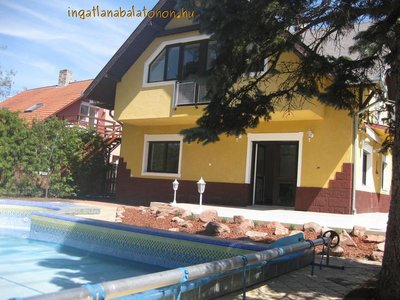 In Zamárdi a waterfront holiday house with a pool is for rent for max 19 people
