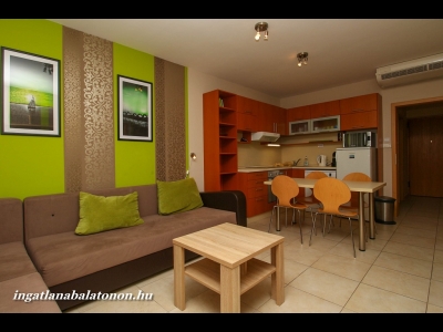 At the Hullám Holiday Resort in Balatonőszöd a modern lakeside apartment is for rent for max 5+1  people